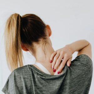 woman with severe neck and back pain after injury